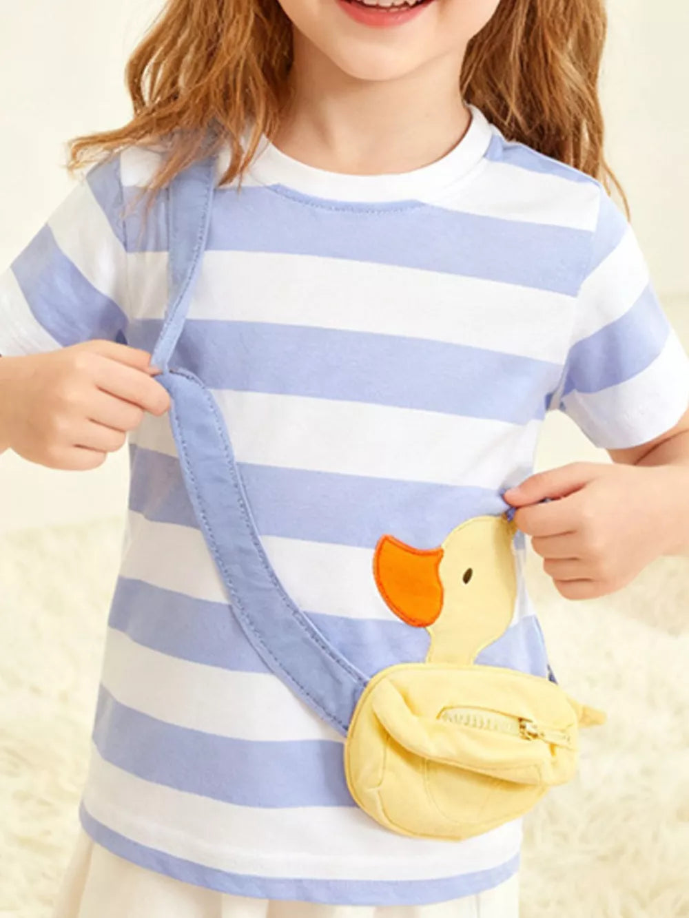 Baby t-shirt with blue and white stripes, a charming duck applique, and a small yellow duck purse.