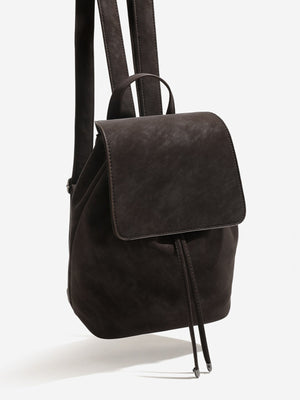 Minimalist Suede Drawstring Backpack in dark brown with adjustable straps