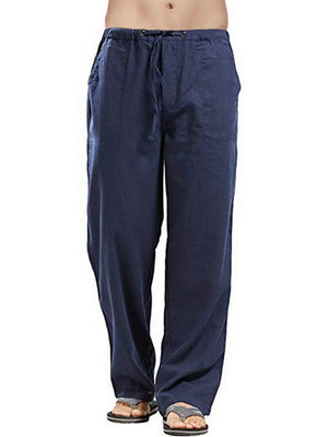 Navy linen drawstring trousers with a relaxed fit and side pockets.