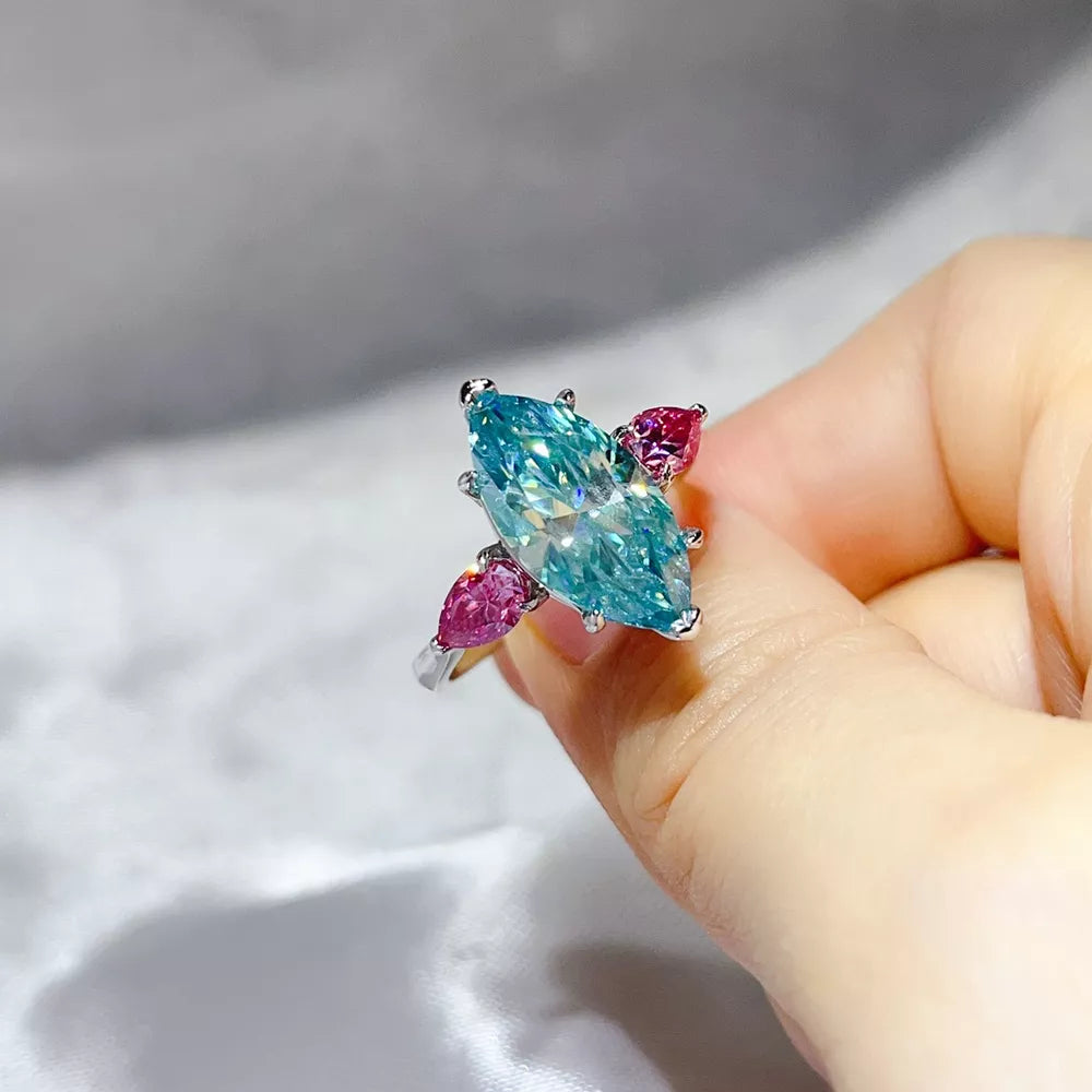925 sterling silver,Moissanite Carat weight: 6ct Care instructions: Avoid wearin ring in hot pink with elongated silhouette