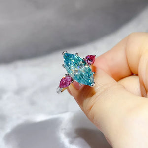 925 sterling silver,Moissanite Carat weight: 6ct Care instructions: Avoid wearin ring in hot pink with elongated silhouette