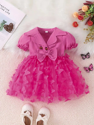 Pink baby dress with collared neckline, puff sleeves, bow and butterfly applique tulle skirt.