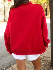 red oversized sweatshirt with mock neck