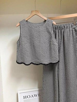 Plaid two-piece outfit set with scalloped trim and wide leg pants.