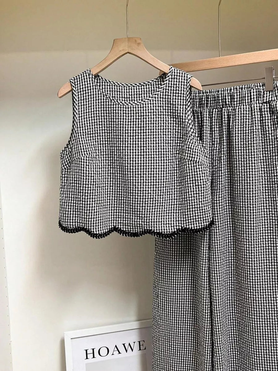 Plaid two-piece outfit set with scalloped trim and wide leg pants.
