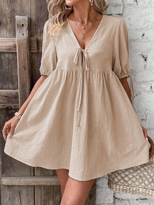 Khaki tie front puff sleeve mini dress with adjustable sleeve ties