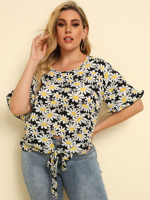 Daisy print blouse with ruffle sleeves and front knot tie
