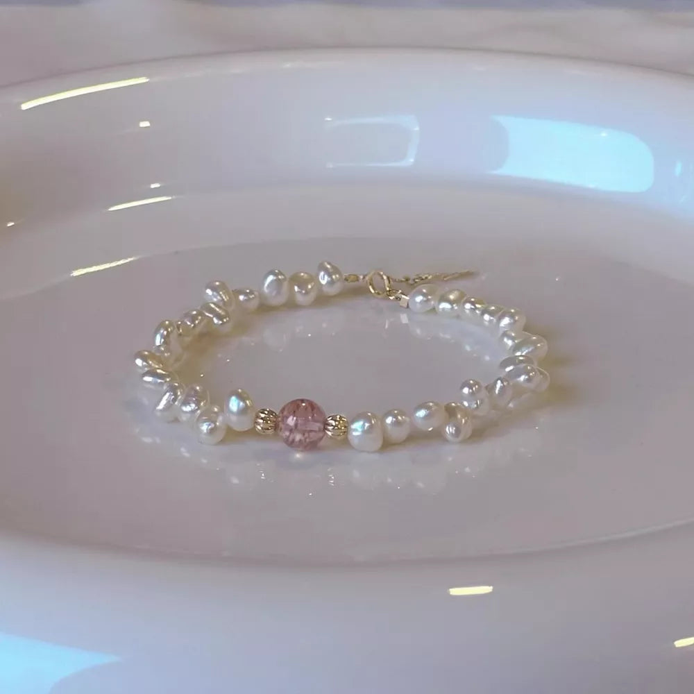 bracelet in ivory featuring pearl accents and fitted fit