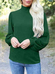 Dark green mock neck top with puff sleeves and button back detail