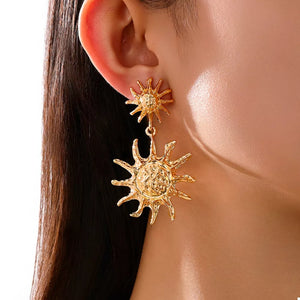 earrings in gold featuring drop design and straight fit