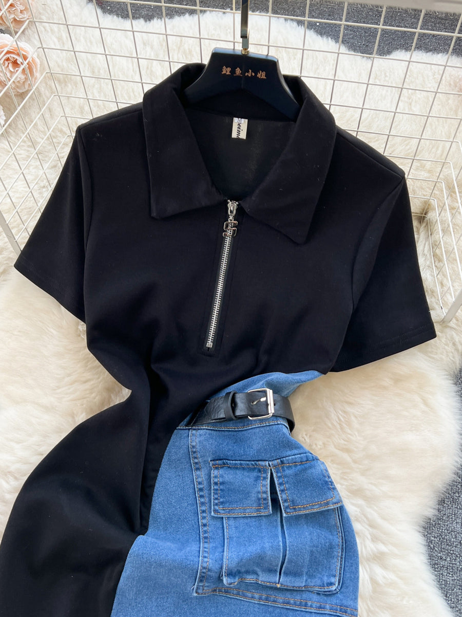 Black collared zip-front short sleeve dress with blue denim skirt featuring cargo pockets and a black belt.