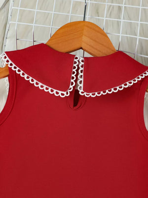 Red toddler dress with lace-trimmed Peter Pan collar and keyhole back detail.