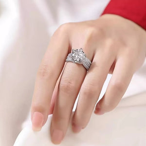Dazzling moissanite silver ring with certificate, 3 carat brilliant center stone and pave band.