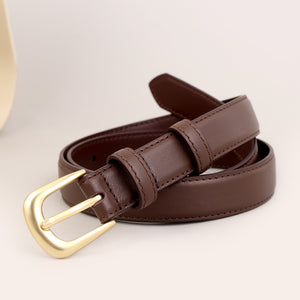 Brown leather belt with a golden buckle