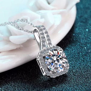 925 sterling silver,Moissanite Carat weight: 5ct Care instructions: Avoid wearin necklace in clear with delicate silhouette