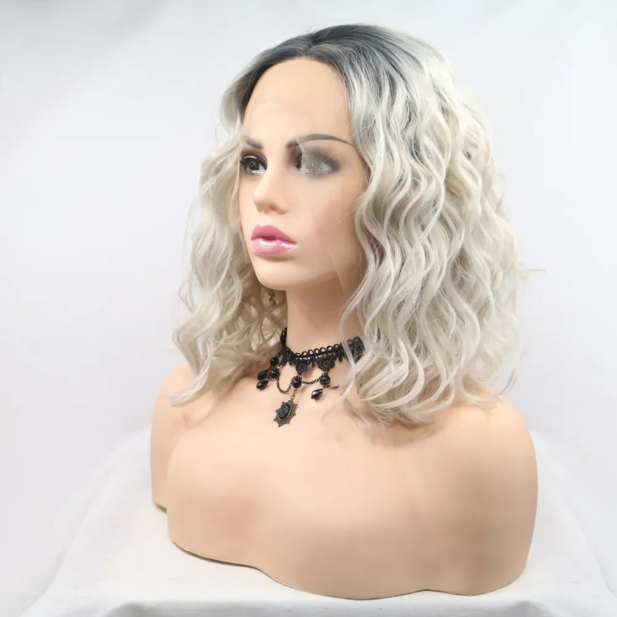 Ombre wave front wig in black and white, bob cut, styled on a mannequin with a black choker.