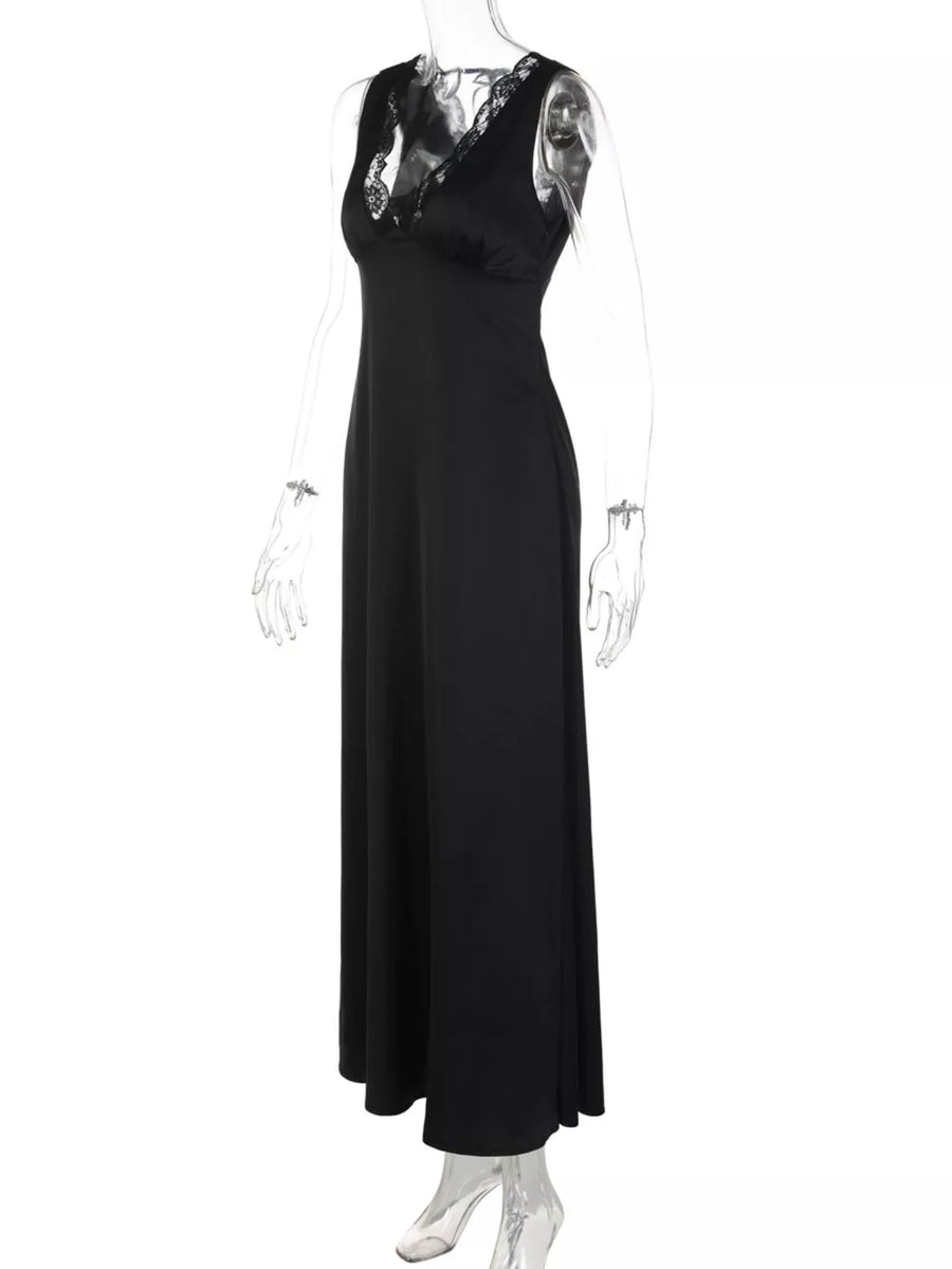 Black sleeveless maxi gown with lace trim neckline and cinched waist.