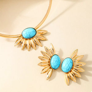 Gold sunflower jewelry set with turquoise stones, including earrings and choker.
