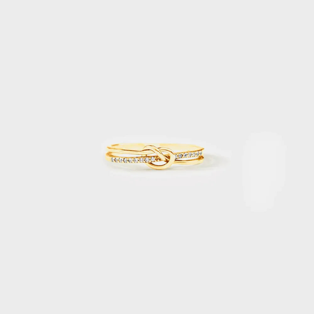 Gold pavé knot sterling silver ring with clear stones