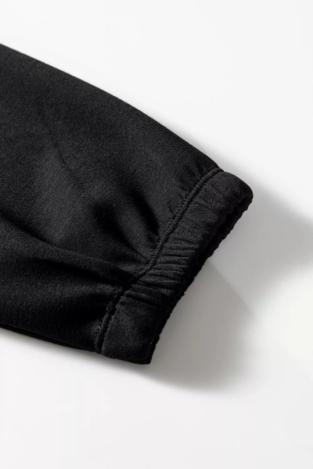 pullover hoodie in Black with leopard-print and drawstring