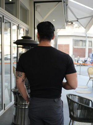 Black ribbed crew neck muscle fit tee with short sleeves.