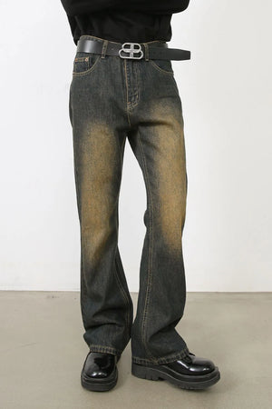 Faded wash bootcut jeans in olive brown with dip dye effect.