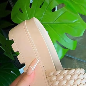 Woven platform slide sandals in cream with a chunky lug sole.