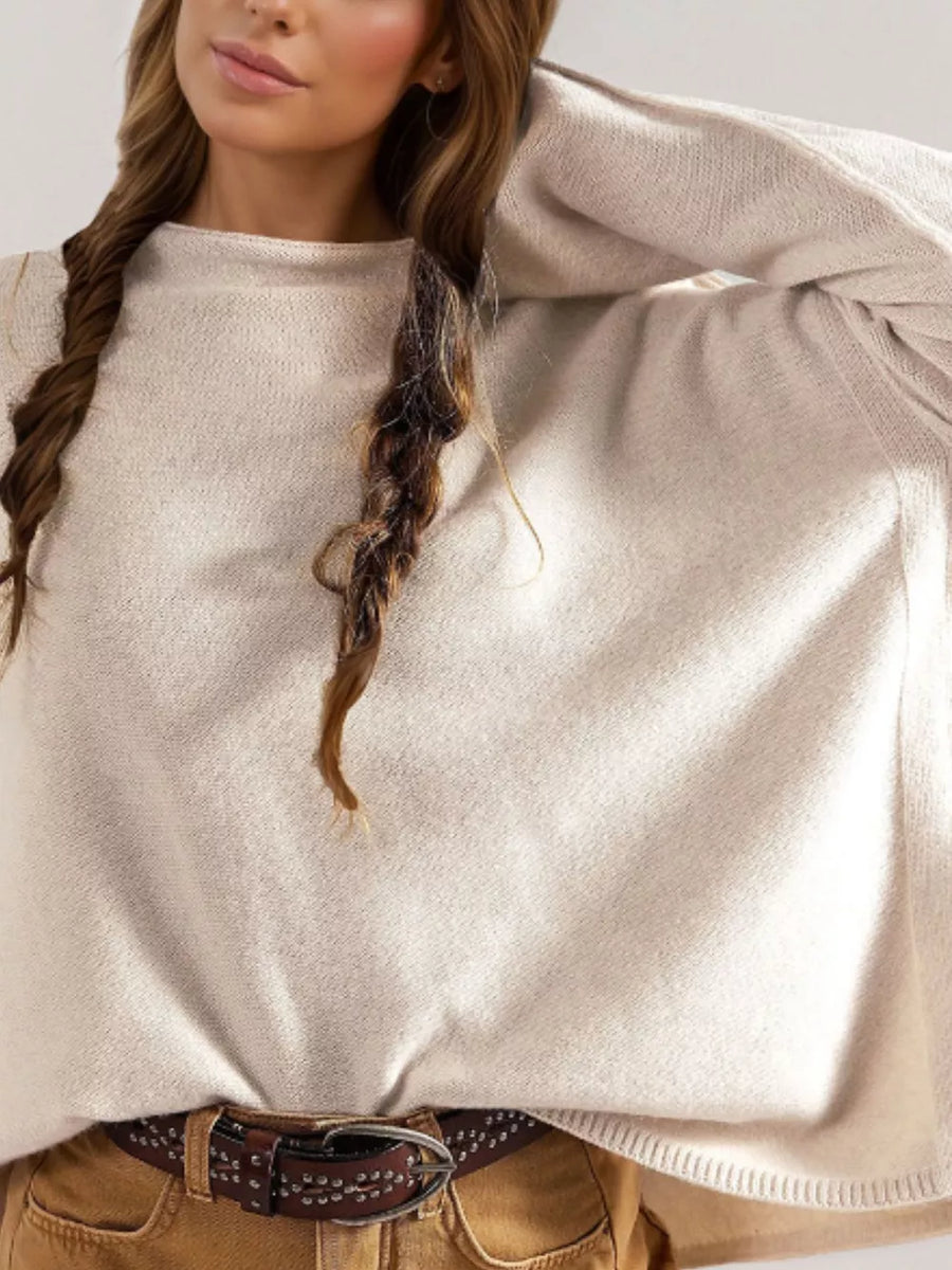 50% Viscose, 28% Polyester, 22% Polyamide Care instructions: Machine wash cold mock neck sweater in Apricot with relaxed