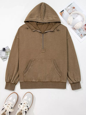 Mineral wash coffee brown baggy half zip hoodie with front pocket and drawstring hood.