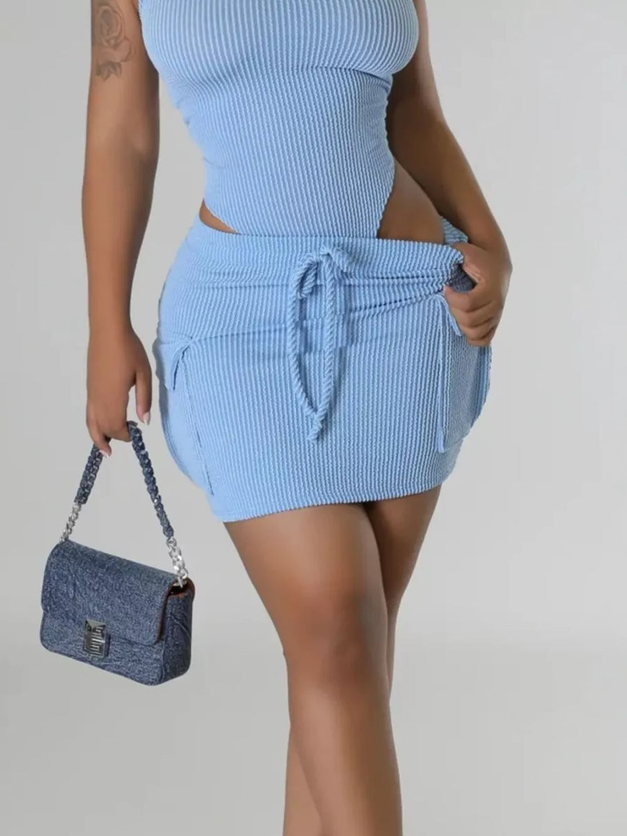 Ribbed blue knit mini skirt with drawstring waist and side pockets