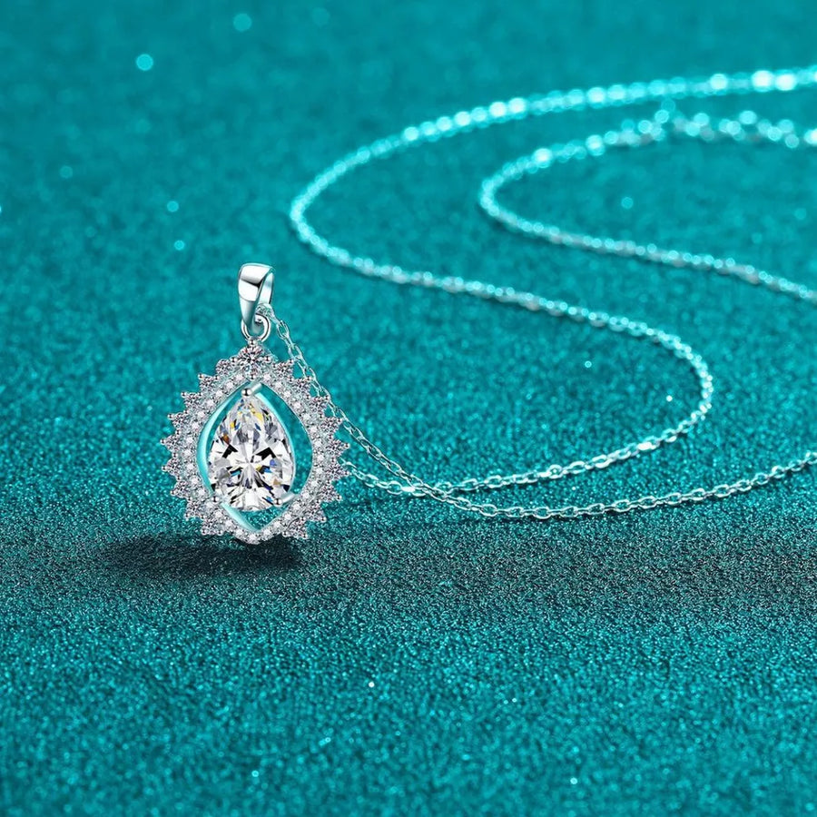 925 sterling silver,Moissanite Carat weight: 3ct Care instructions: Avoid wearin necklace in clear with teardrop silhouette