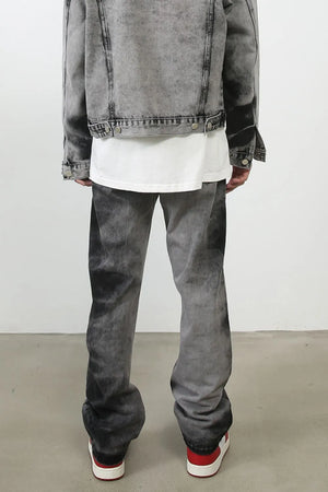 Charcoal wash straight leg denim jeans with a faded, distressed look.