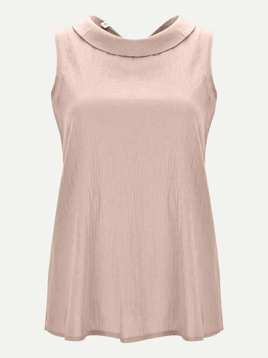 Sleeveless Peter Pan collar blouse in a textured light pink fabric.