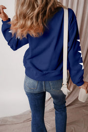 Navy graphic sweatshirt with white stars on sleeves, crewneck, cotton-polyester blend.