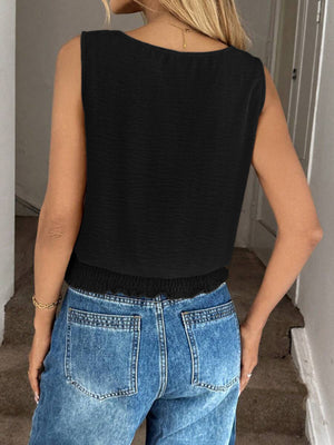 Black smocked waist tank top with relaxed fit and scoop neckline.
