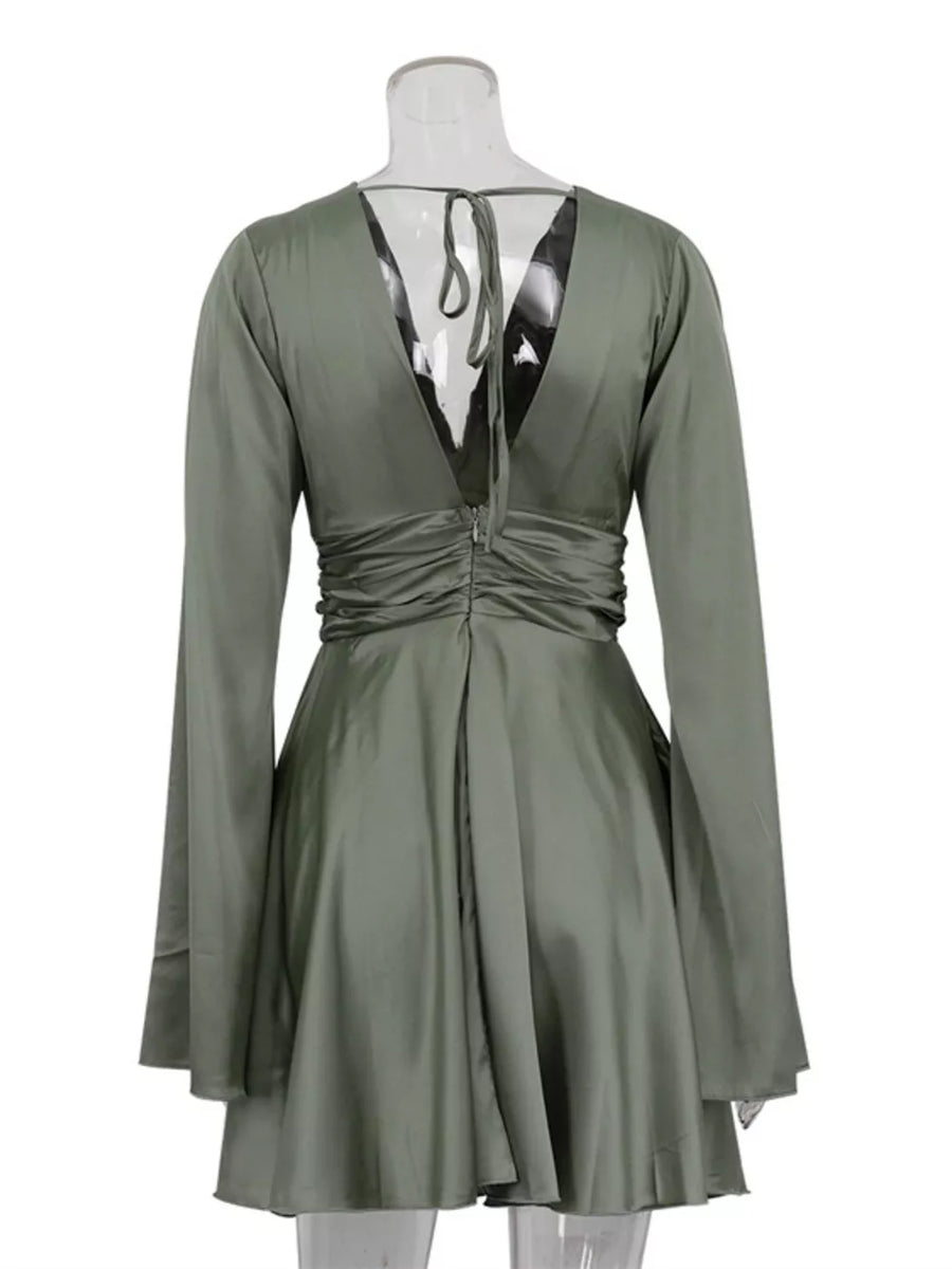 Sage green ruched wrap dress with deep V-neck and tie back, long bell sleeves.