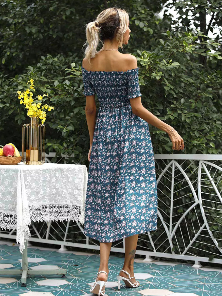 Floral off-shoulder midi dress in deep teal with smocked bodice and side slit.