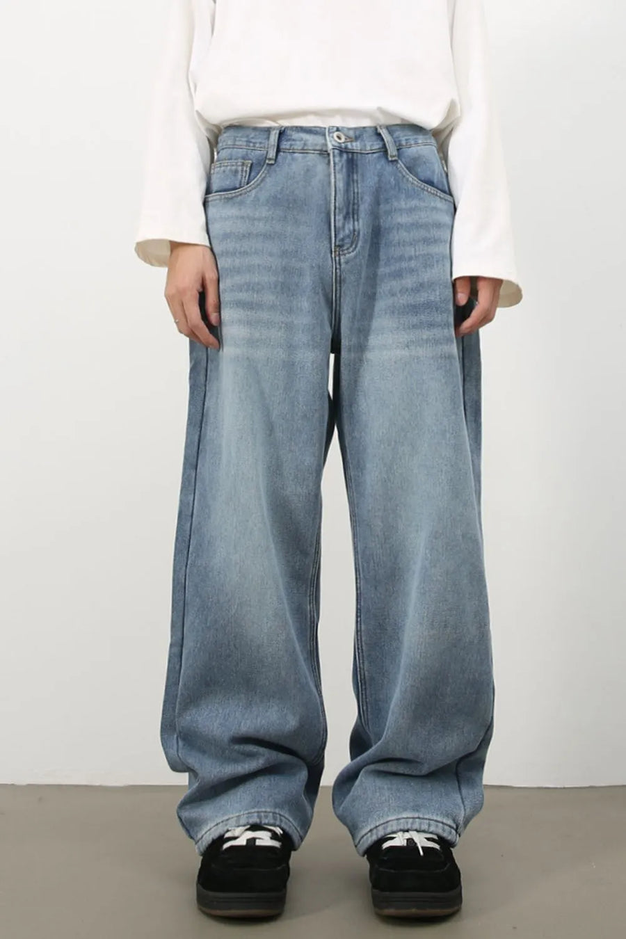 Oversized fade wash denim jeans in medium blue, wide leg, casual fit
