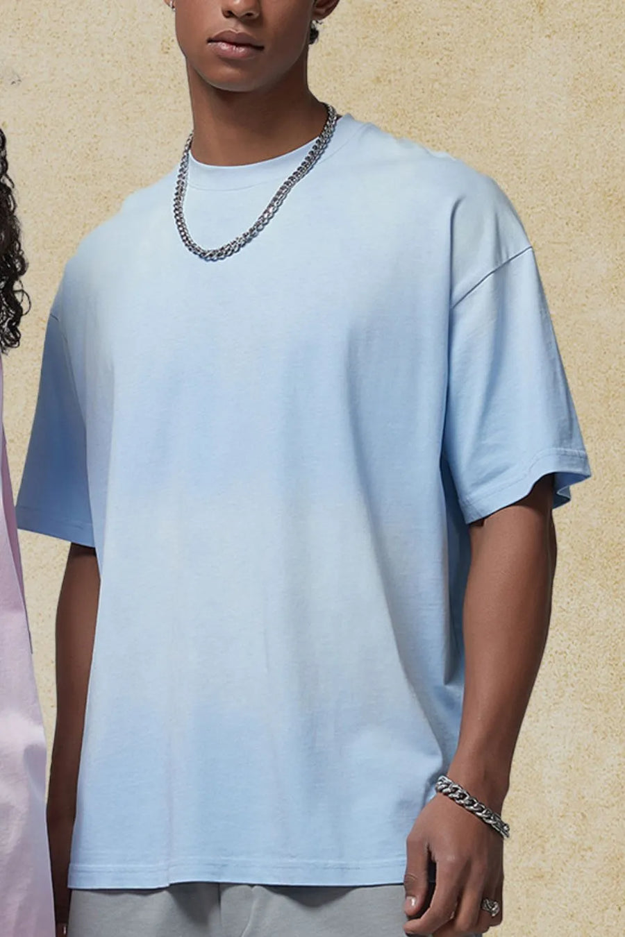 Oversized washed tee in light blue with relaxed fit and crew neck.