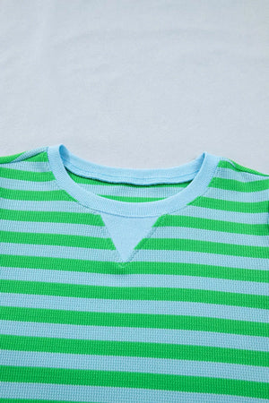 Long sleeve thermal shirt with green and blue stripes and a contrast neckline.
