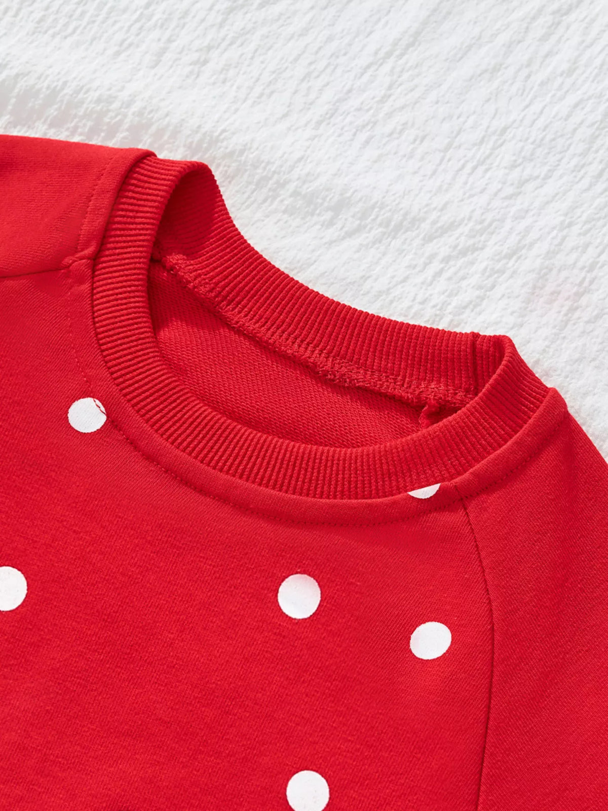 Red cotton crew neck sweatshirt with white polka dots