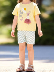 Yellow cotton tee with bunny graphic and checkered shorts for girls.