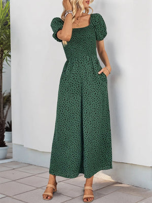 Dark Green leopard print smocked bodice jumpsuit with puff sleeves and wide legs.