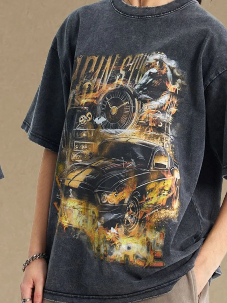 Black vintage wash graphic tee with racing car and flames motif.