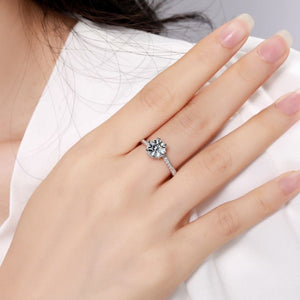 925 sterling silver,Moissanite Carat weight: 1ct Care instructions: Avoid wearin ring in clear with bypass silhouette