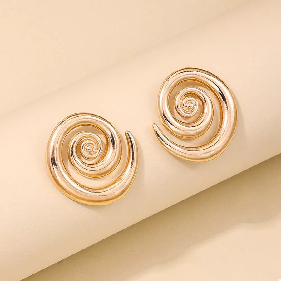 18K Gold-Plated,Zinc alloy Care instructions: Avoid wearing during exercise, as earrings in gold with spiral silhouette