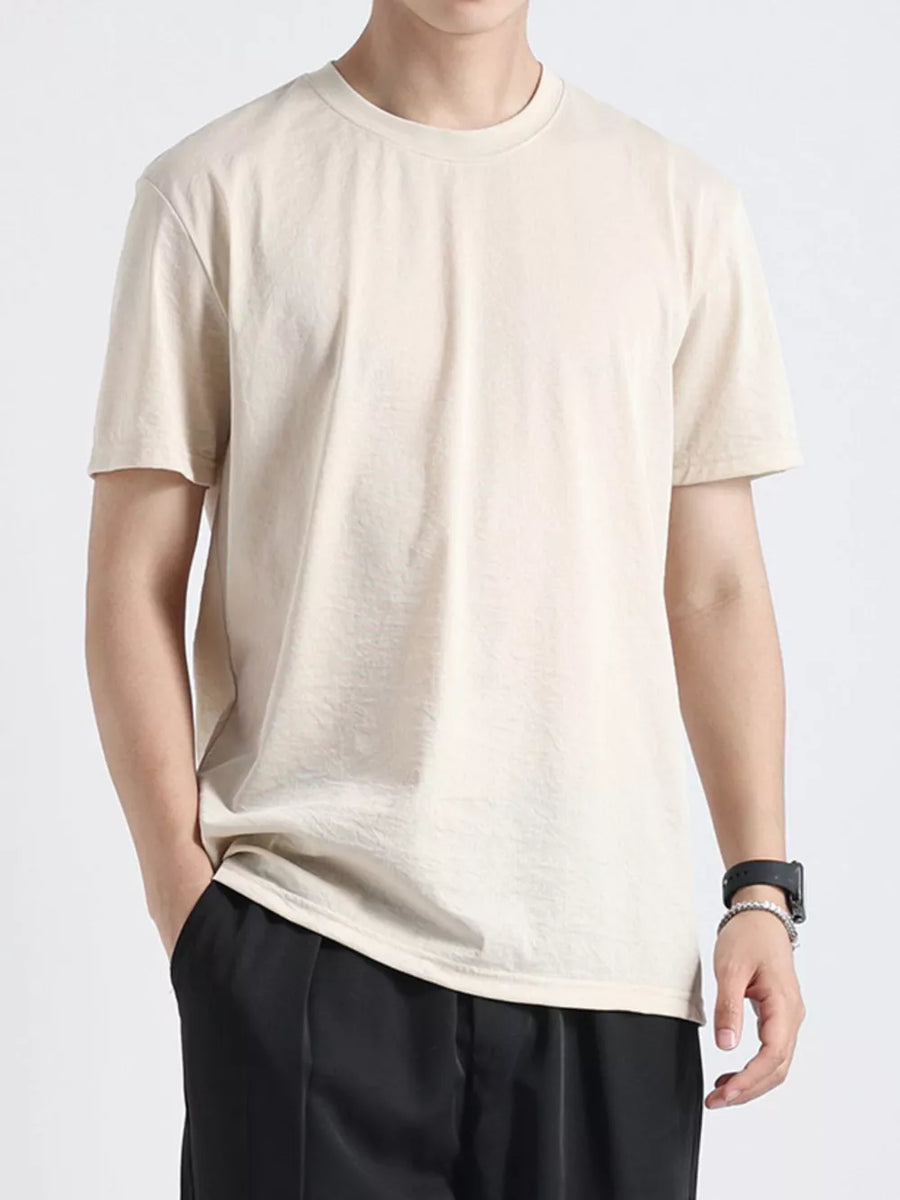 Relaxed fit men's apricot cotton t-shirt with crew neck and short sleeves.