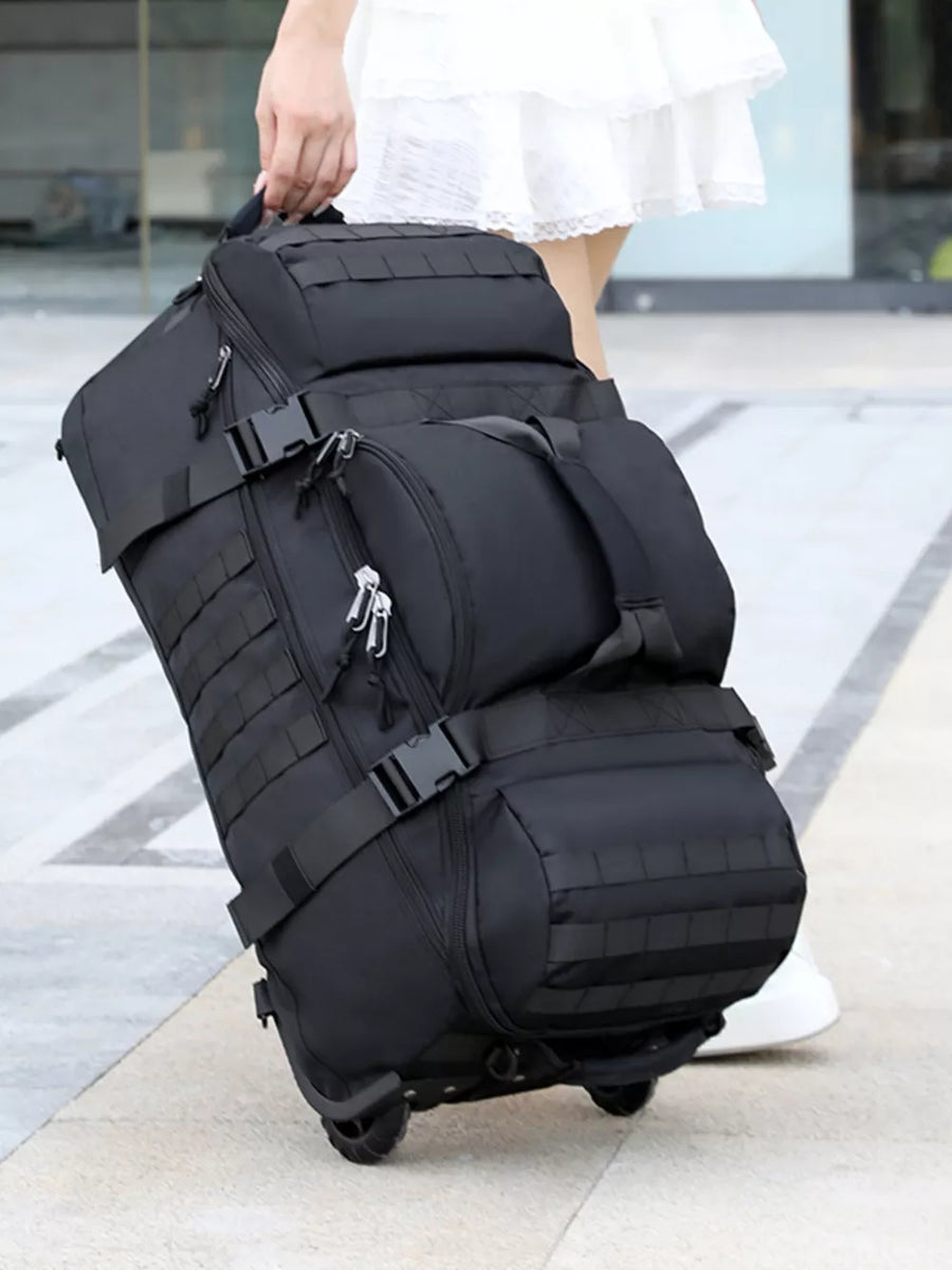 Black tactical rolling duffel bag with multiple compartments and MOLLE webbing