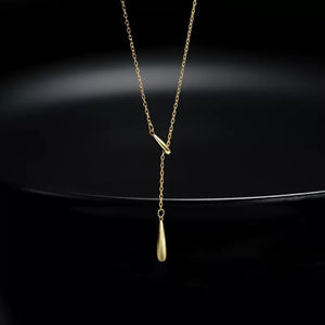 Gold Y-shaped pendant necklace with a teardrop charm, 18k gold-plated.