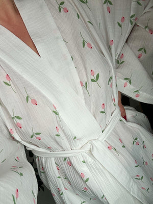 White cotton robe with pink floral print, tie waist, and V-neck